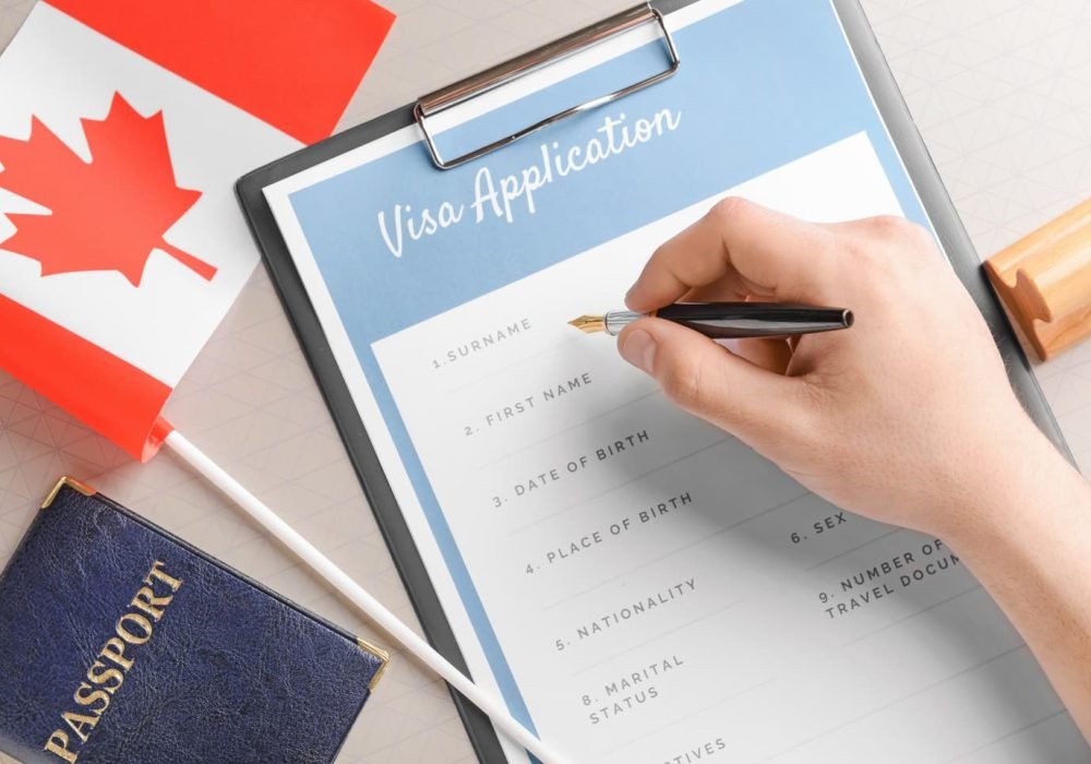 Person-filling-out-a-Canadian-visa-application